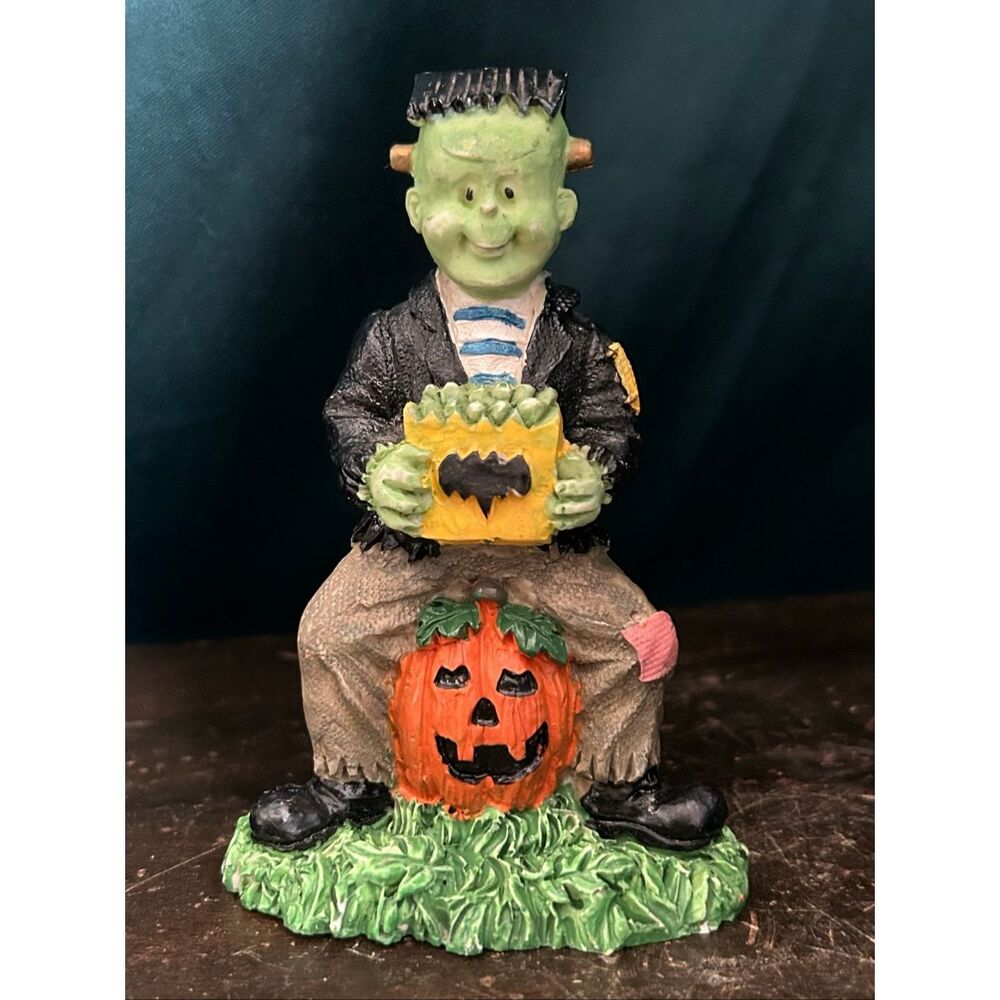 90’s Cute Halloween Frankenstein’s Monster Figurine Sitting on a Jack o’Lantern